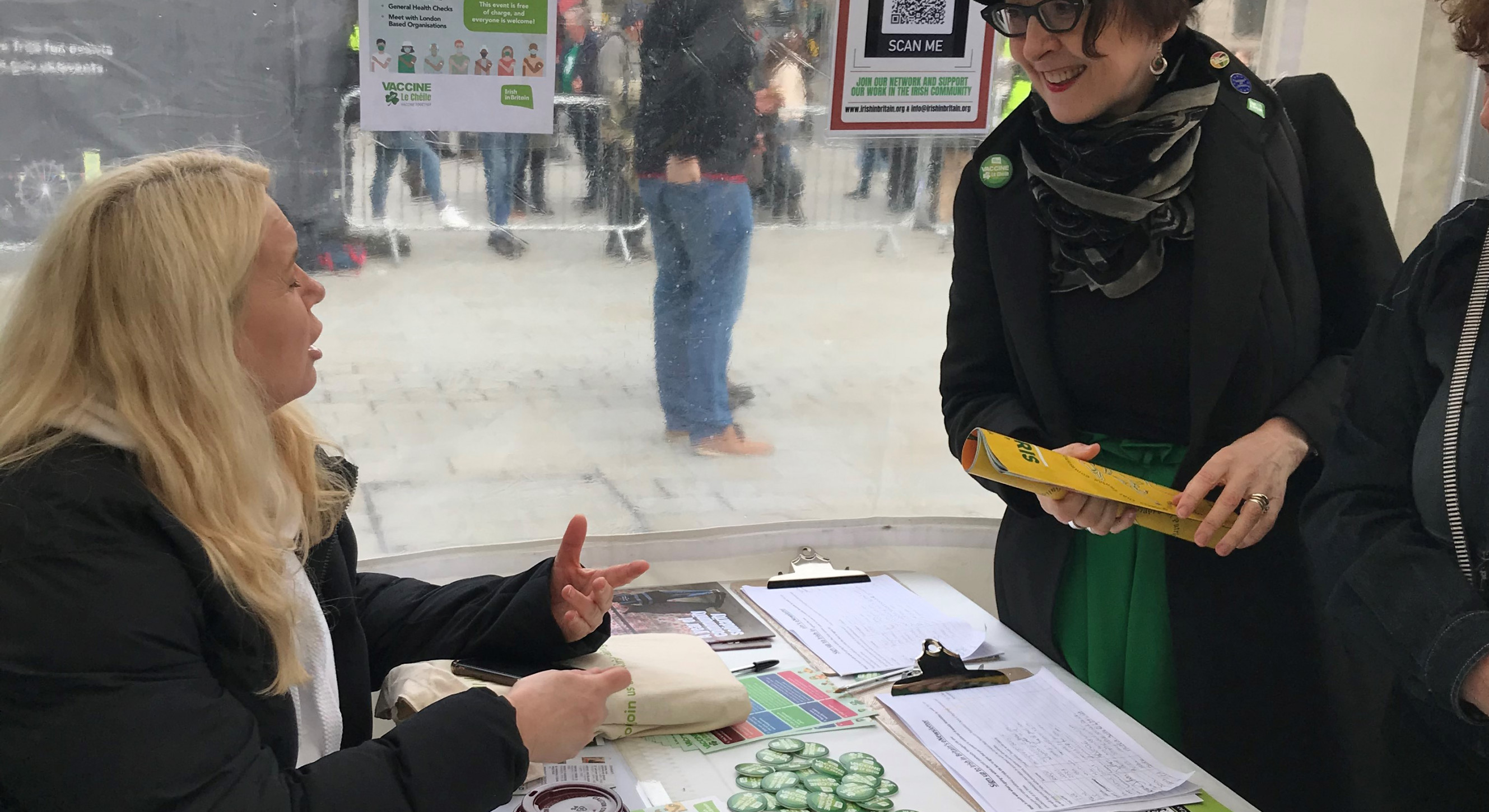 Irish in Britain volunteer Valerie Nangle talks to one of our Trustees, Breda Corish on our stall.