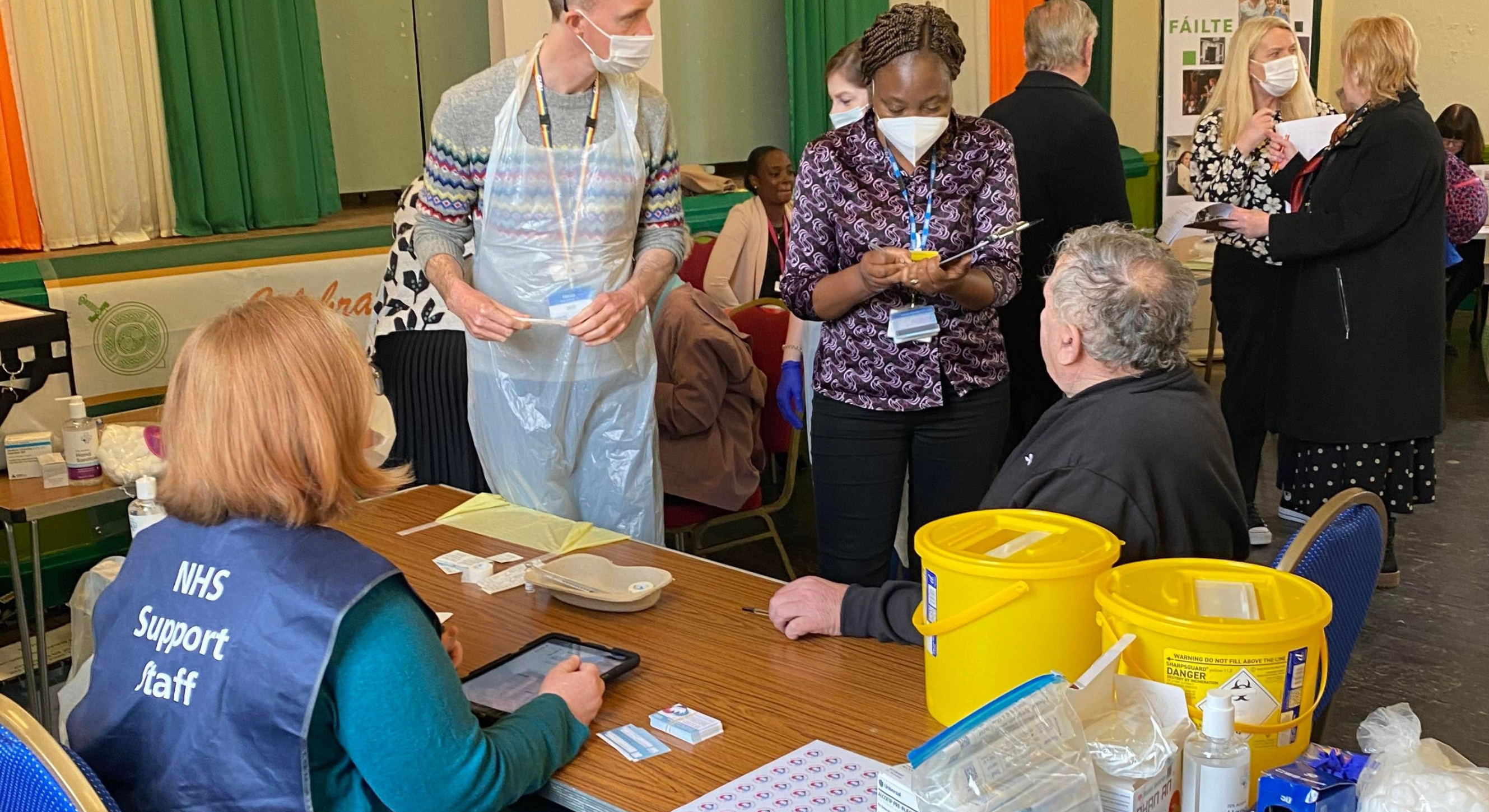 NHS staff give vaccine at Lewisham's Irish CommunityCentre's Community Health Day